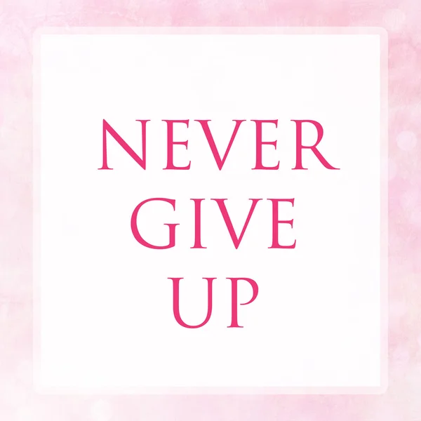 Nooit Give Up op roze pastel poster achtergrond — Stockfoto