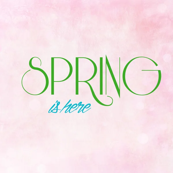 SPRING IS HERE on pink pastel background — Stock Photo, Image