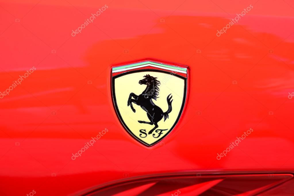 MALLORCA - JULY 31, 2015: Sign of Ferrari car. Ferrari is an Italian luxury sports car manufacturer based in Maranello.