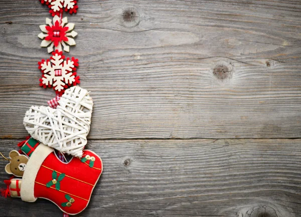 Christmas ornament on wood background — Stock Photo, Image