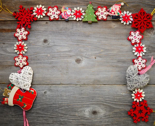 Christmas ornament on wood background — Stock Photo, Image