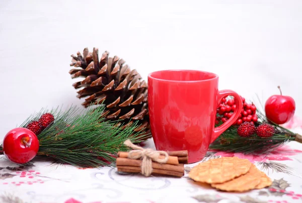 Closeup of Christmas cookie, tea and ornaments — Stock Photo, Image