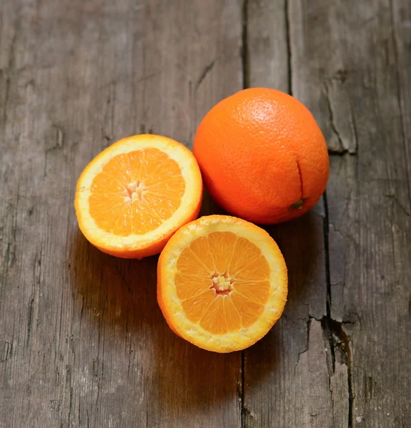 Fresh orange on wooden backgroud — Stock Photo, Image