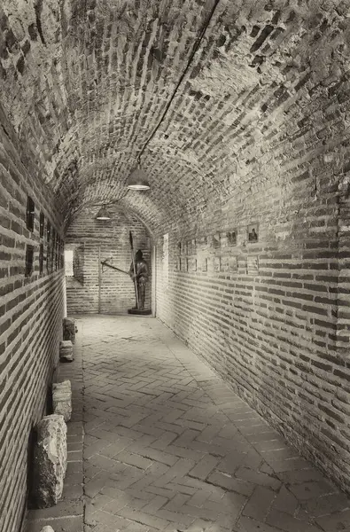 stone tunnel and knight armor in black and white