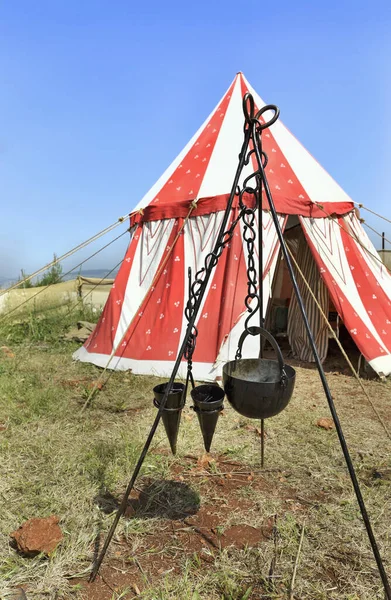 Bins for food on the background of a tent at a medieval festival