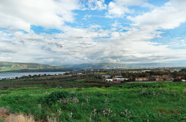 Panorama of the Kinneret lake on the background of beautiful clouds in Israel