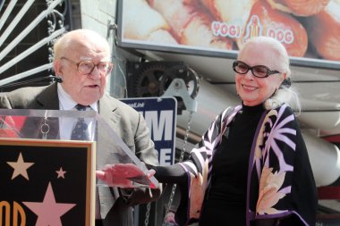 Ed Asner, Barbara Bain