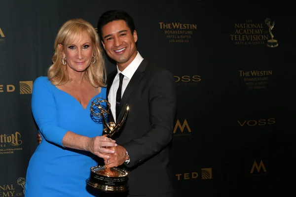 Lisa Gregorisch-Dempsey, Mario Lopez — Stockfoto