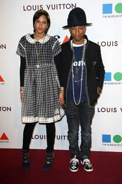 Pharrell Williams und Helen Lasichanh — Stockfoto