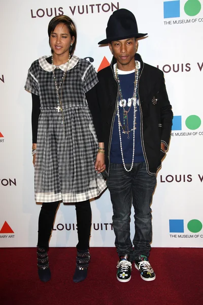 Pharrell Williams et Helen Lasichanh — Photo