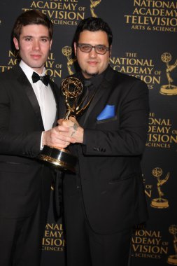 Kristos Andrews, Gregori J Martin