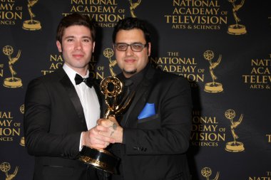 Kristos Andrews, Gregori J Martin