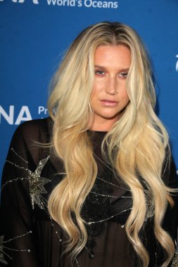 Kesha - singer, woman