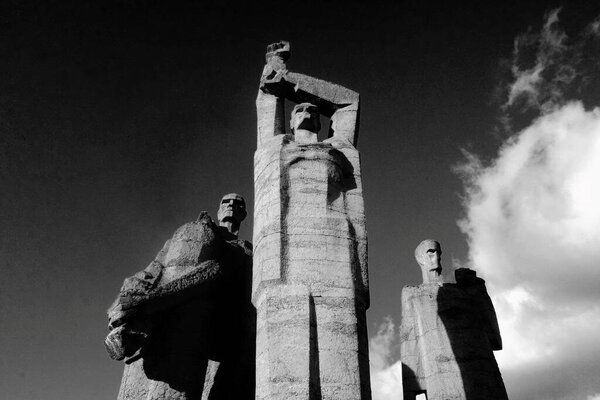     SALASPILS, LATVIA - november 11: Salaspils Memorial Ensemble concrete sculptures of monumental scale. Ex Nazi prison-camp. Black and white photography with film grain                           