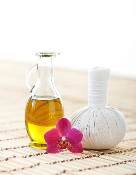 Orchid, jar with oil and massaging ball — Stock Photo, Image