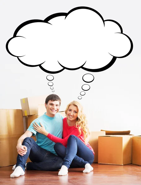 Young couple moving in a new home — Stock Photo, Image