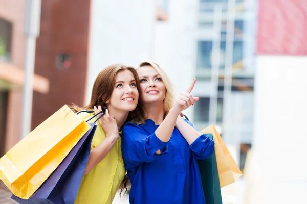 Gorgeous young blond with beautiful brunette — Stock Photo, Image