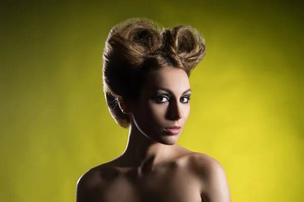 Portrait of a beautiful woman with a bizarre haircut — Stock Photo, Image