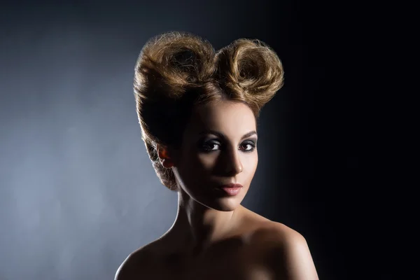 Portrait of a beautiful woman with a bizarre haircut — Stock Photo, Image