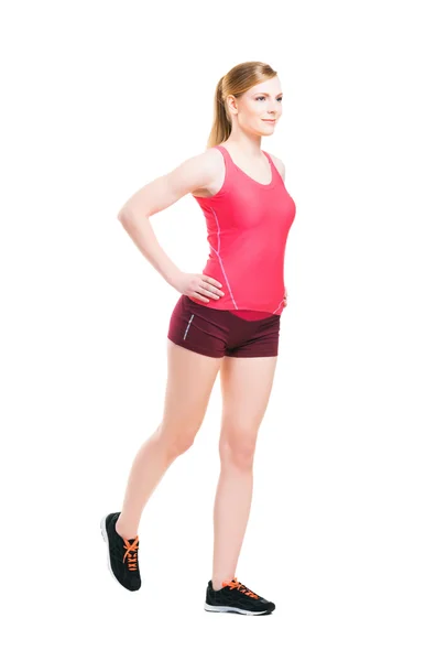 Fiziksel egzersizleri yapıyor spor giyim uygun kadın — Stok fotoğraf