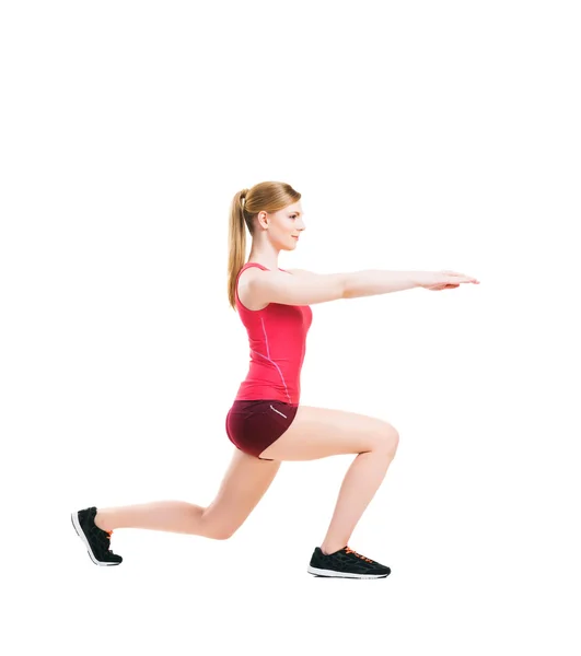 Fit mulher em sportswear fazendo exercícios físicos — Fotografia de Stock