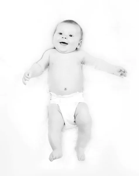 Усміхнений немовля в підгузник — стокове фото