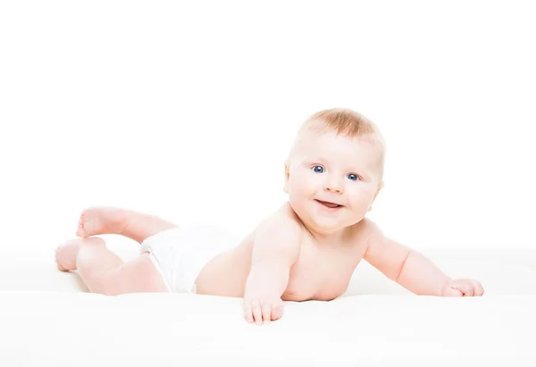 Aranyos, mosolygós, csecsemő baba csúszó portréja — Stock Fotó