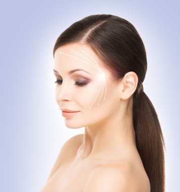 Çekici, genç ve kadın o okları ile Spa portresi