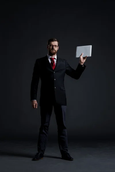 Businessman holding tablet computer — Stock Photo, Image