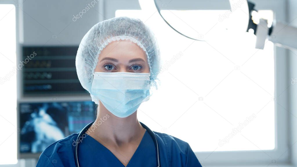 Professional medical doctor working in emergency medicine. Portrait of the nurse in protective mask. Medical concept.