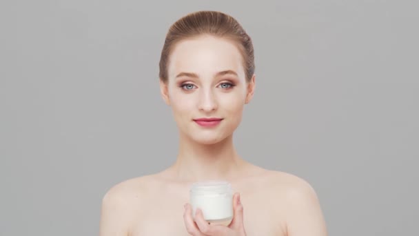 Studio Portrait Young Beautiful Natural Blond Woman Applying Skin Care — Stock Video