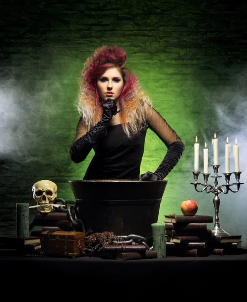 Beautiful witch making witchcraft — Stock Photo, Image