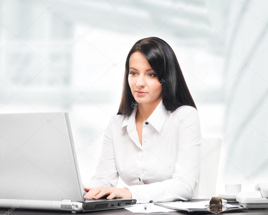 Young and attractive business woman working