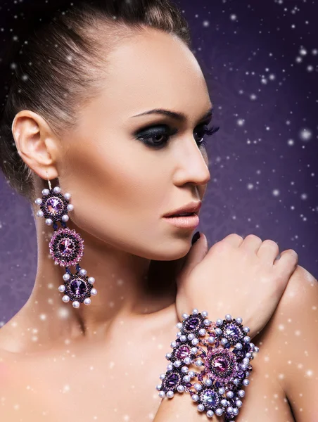 Woman with jewelries — Stock Photo, Image