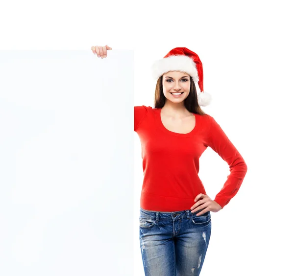 Young and sexy woman in a Christmas hat — Stock Photo, Image