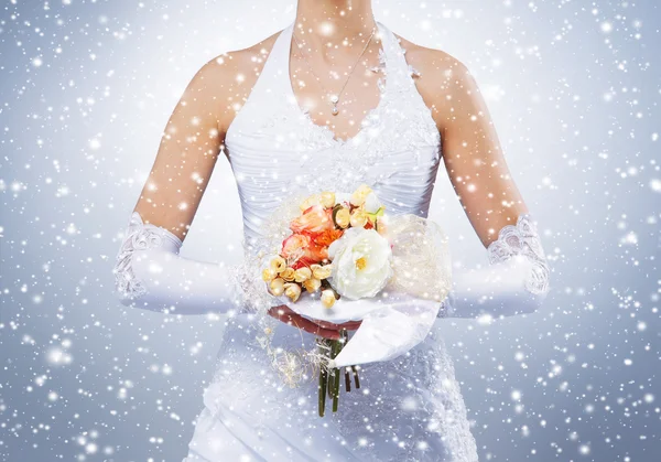 Bouquet in bride's hands — Stock Photo, Image