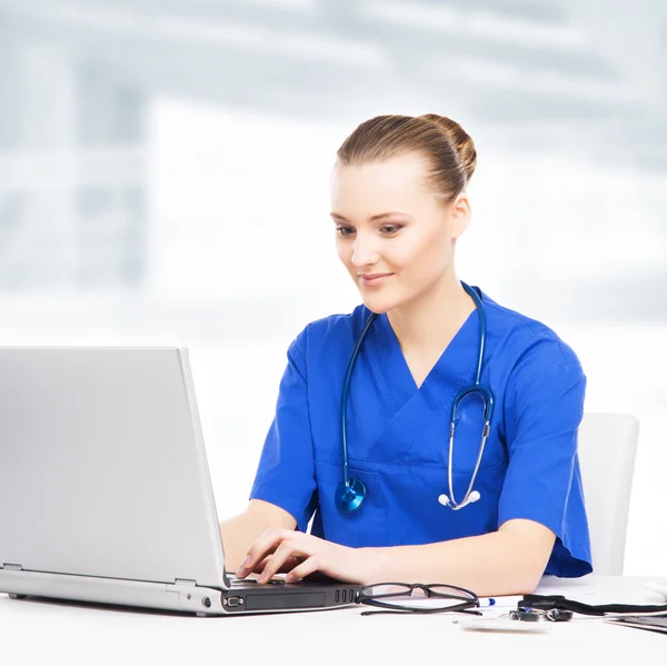 Young and professional doctor working — Stock Photo, Image