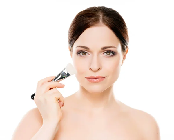 Woman holding makeup brush — Stock Photo, Image
