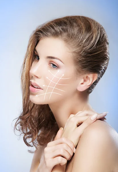 Healthy woman with arrows — Stock Photo, Image