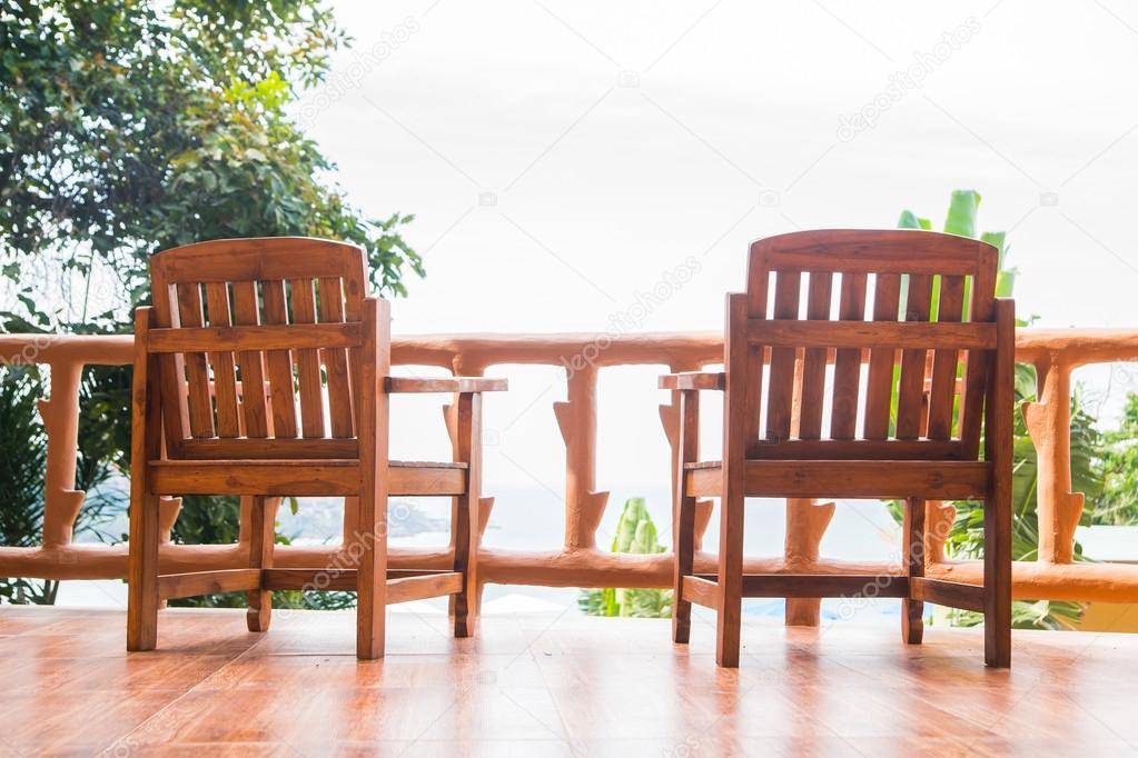 Two chairs on the balcony in Thailand.