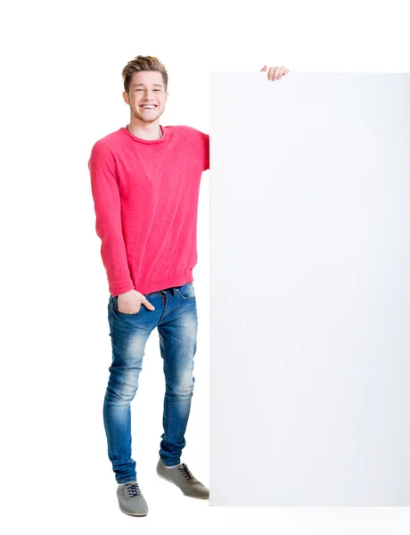Teenager holding  blank banner — Stock Photo, Image