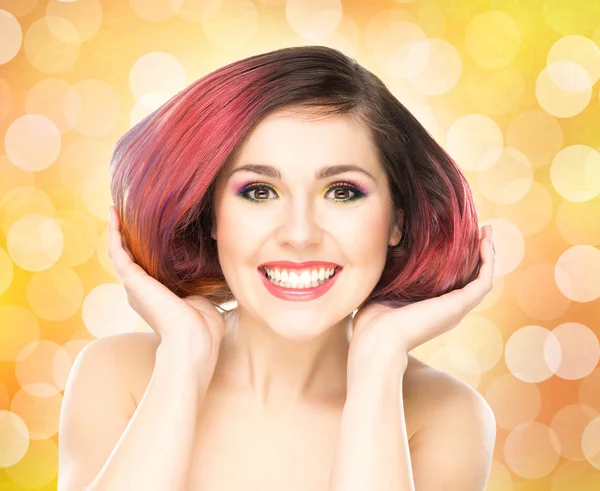 Sorridente ragazza con trucco colorato — Foto Stock