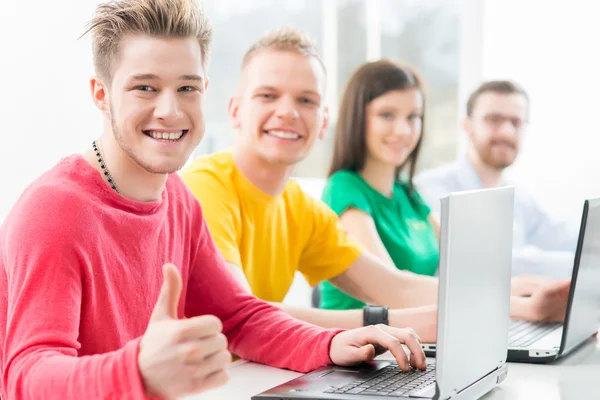 Students studying at  informatics lesson — Stock Photo, Image