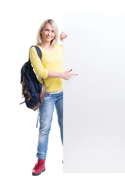 Adolescente estudante com banner em branco — Fotografia de Stock