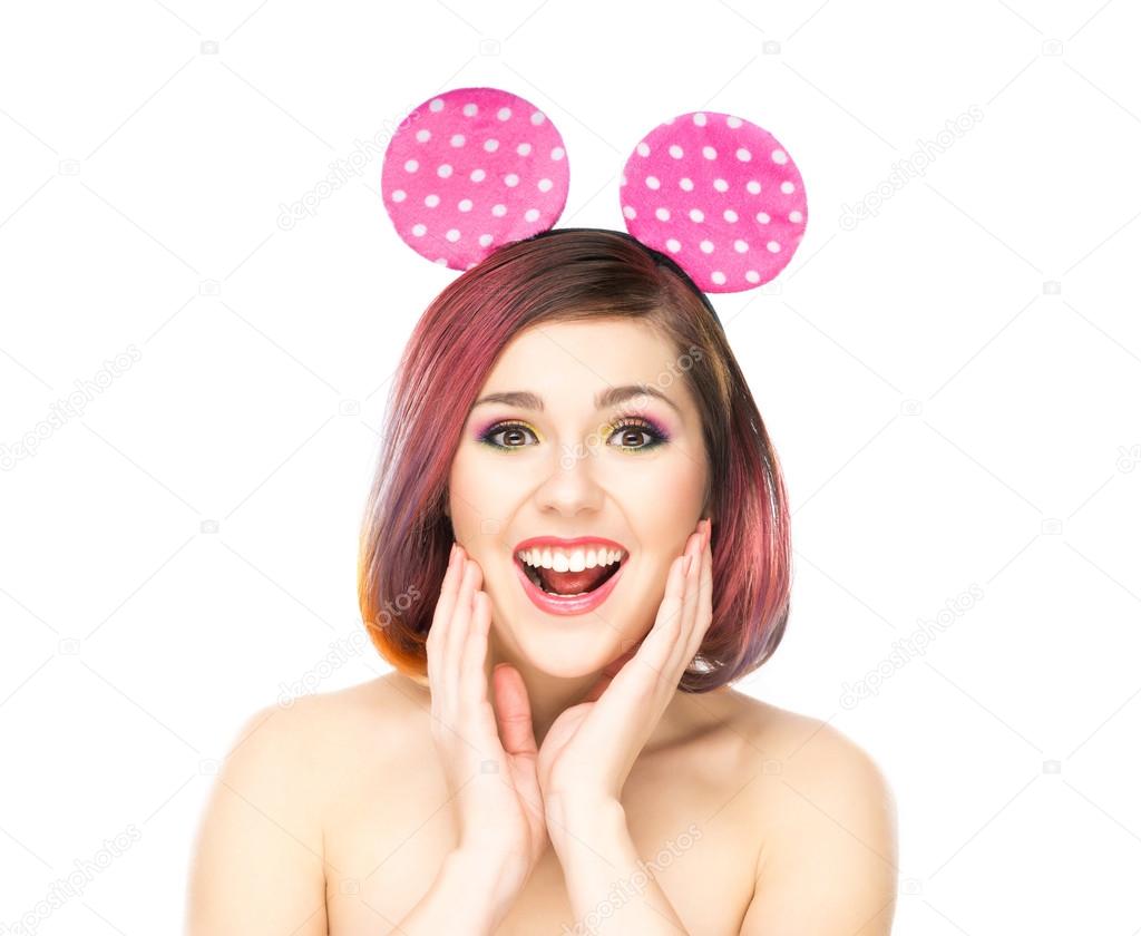 woman in mickey mouse ears.