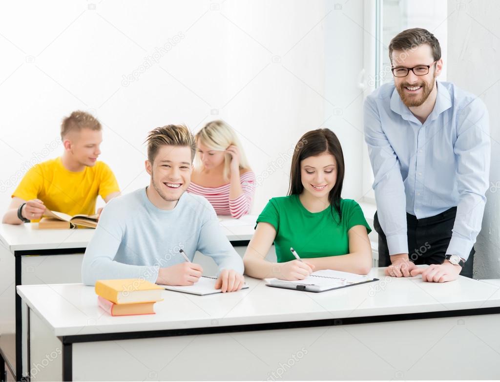 Students and  teacher  in classroom