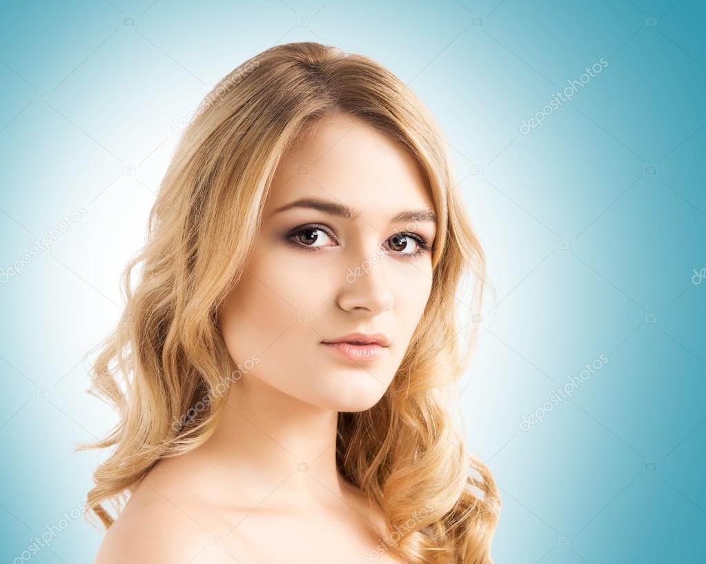 Young blonde woman Stock Photo by ©shmeljov 79649900
