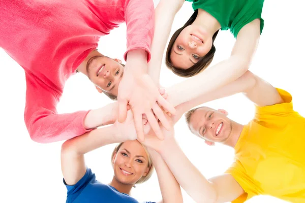 Studenten in kleurrijke kleding hand in hand — Stockfoto