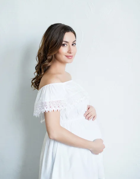 Beautiful pregnant woman on white background — Stock Photo, Image