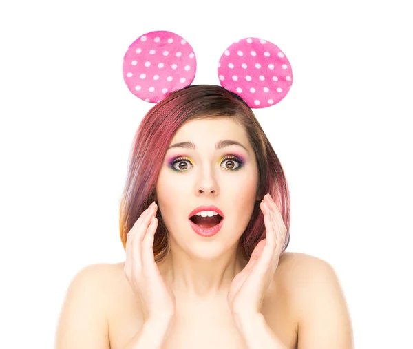 Beautiful surprised woman in mickey mouse ears — Stock Photo, Image